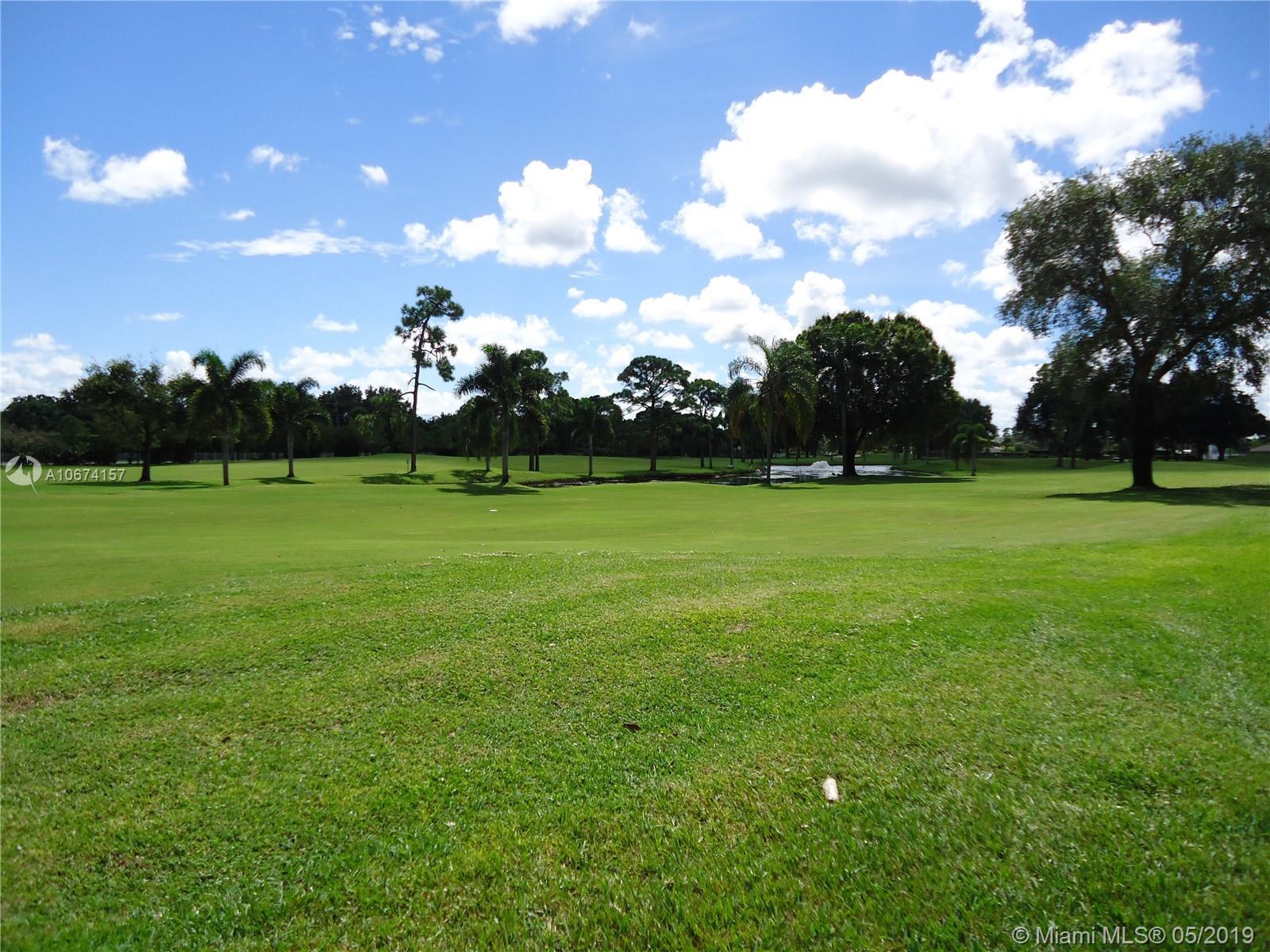 18429 SE Wood Haven Ln. # J, Tequesta FL 33469 photo 4
