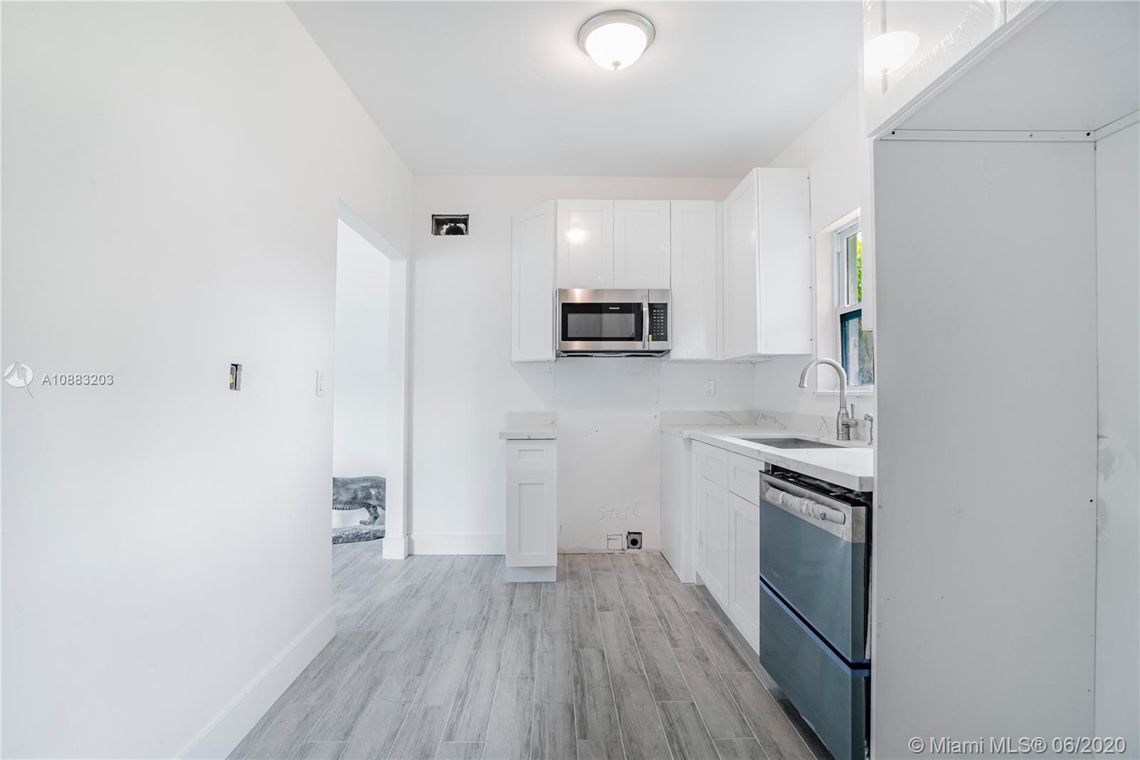 1230 NW 125th St, North Miami FL 33167 photo 2