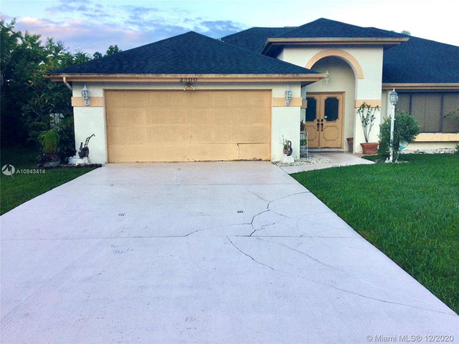 2300 SW Monterrey Ln, Port St. Lucie FL 34953