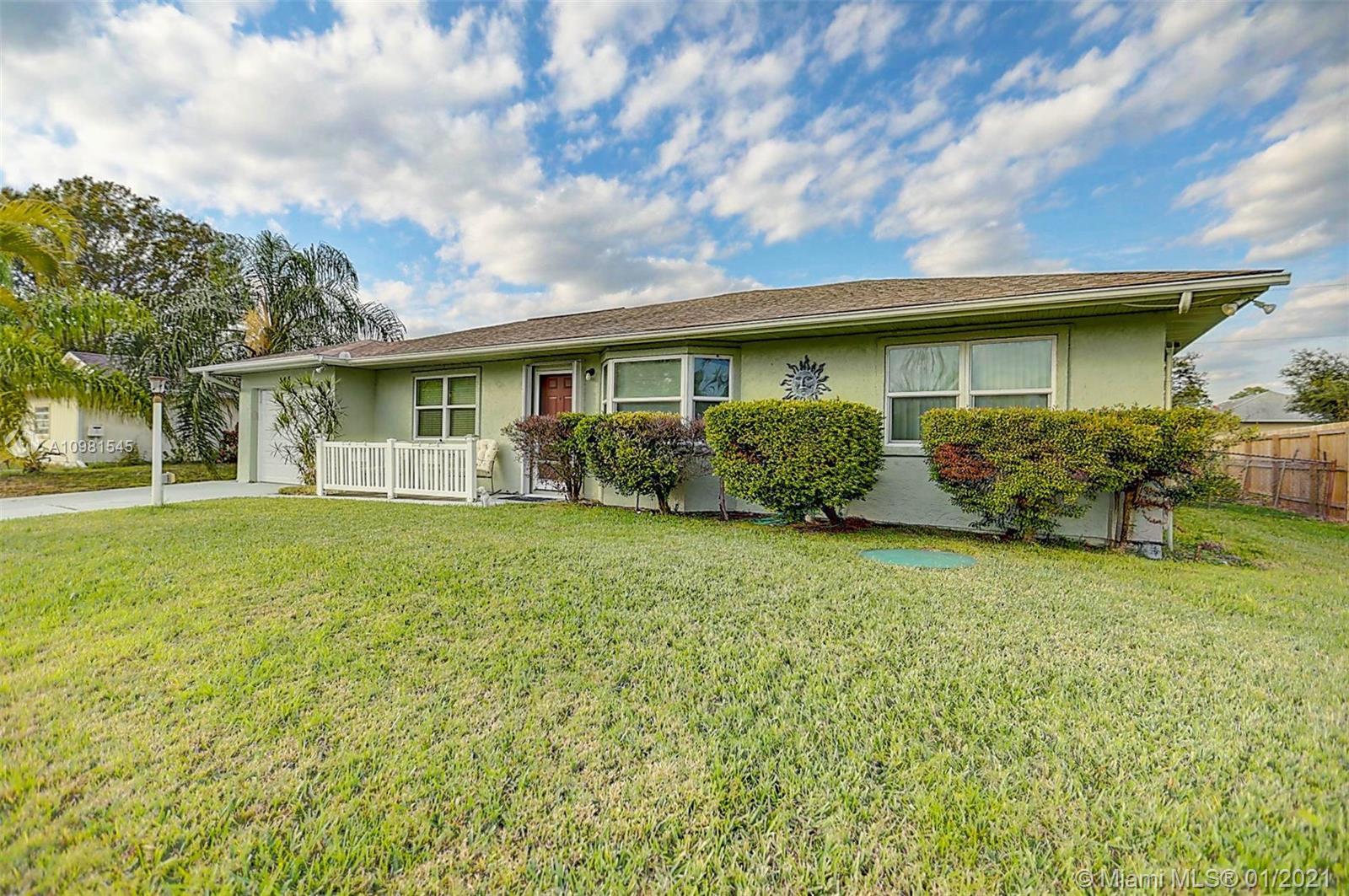 585 SW Ester Ave, Port St. Lucie FL 34983 photo 2