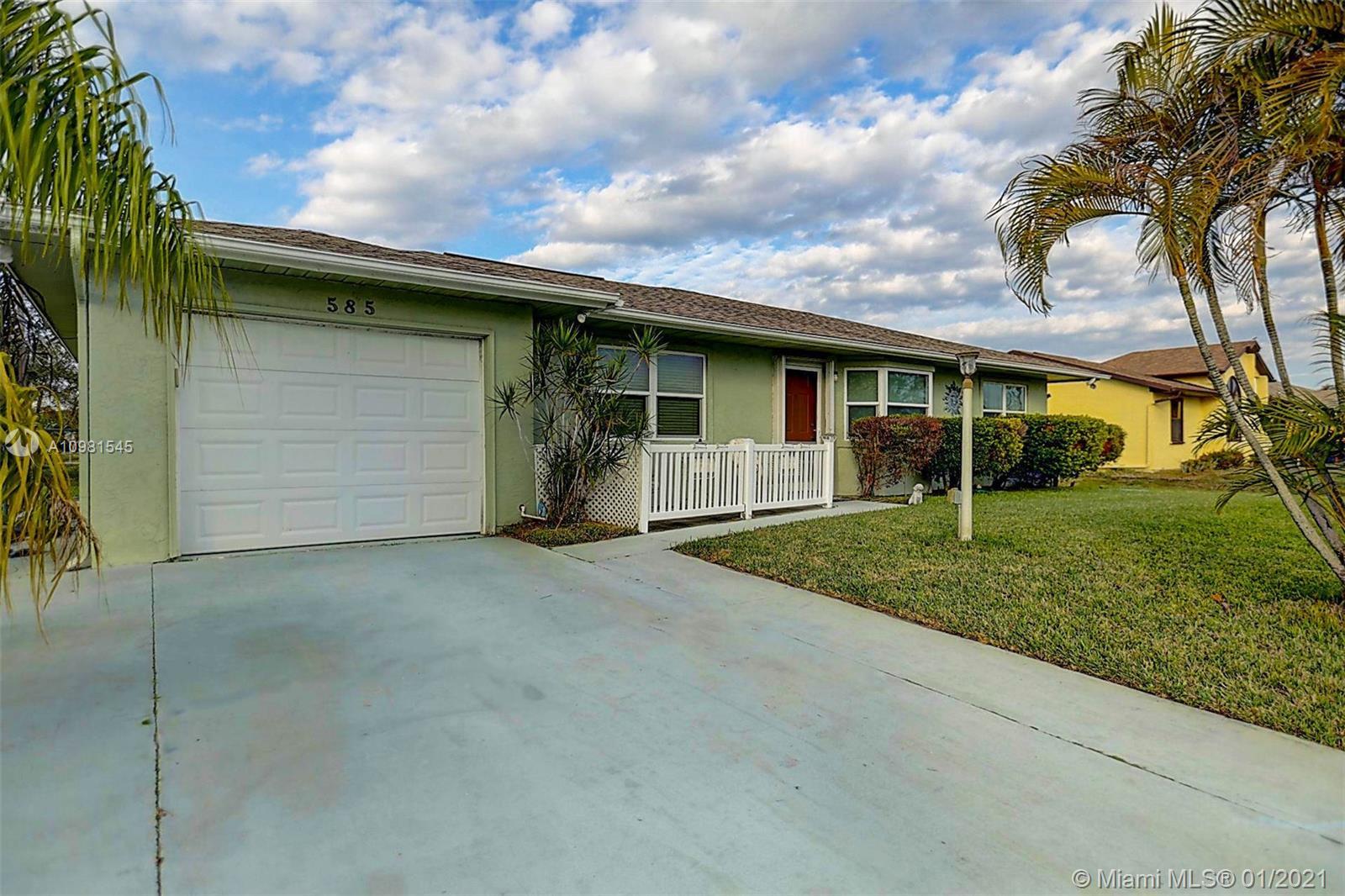 585 SW Ester Ave, Port St. Lucie FL 34983 photo 3