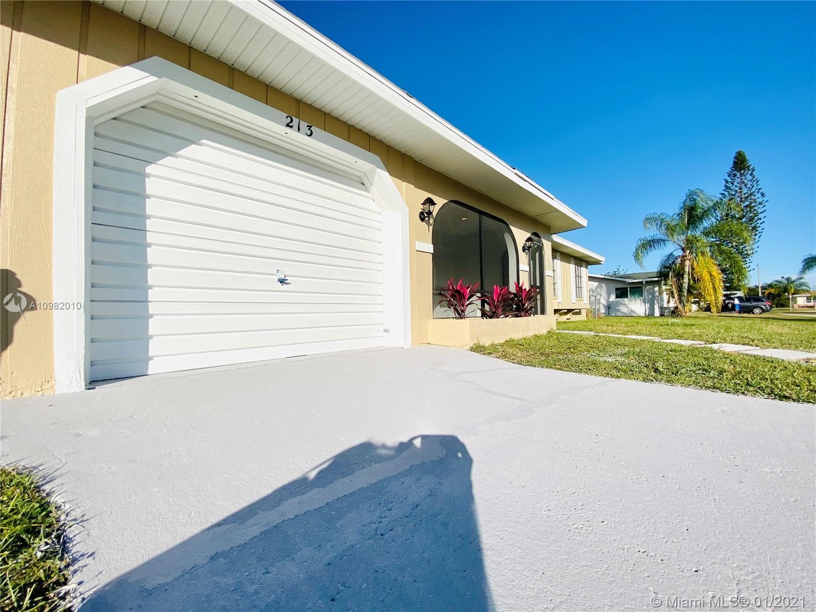 213 SW Dabney Dr, Port St. Lucie FL 34983 photo 2