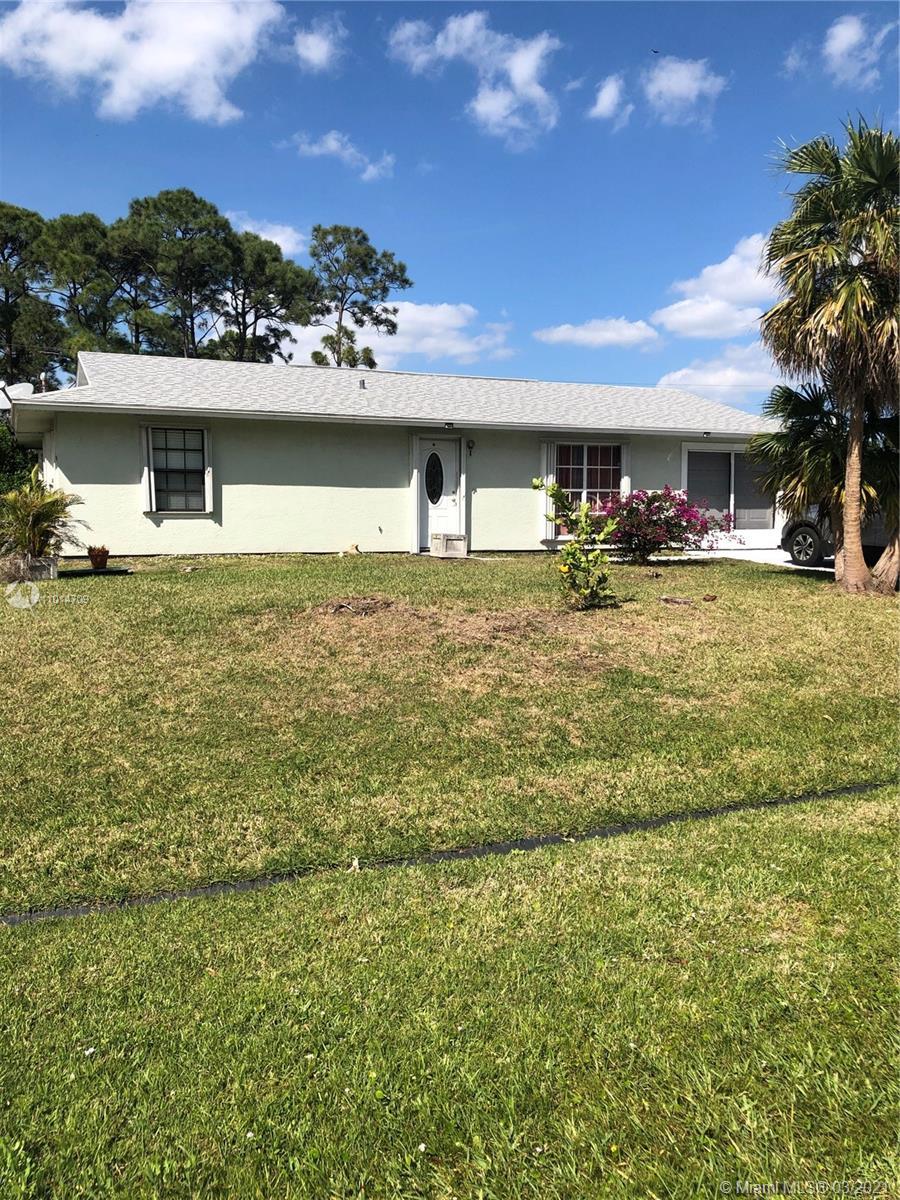 1017 SW Mantilla Ave, Port St. Lucie FL 34953