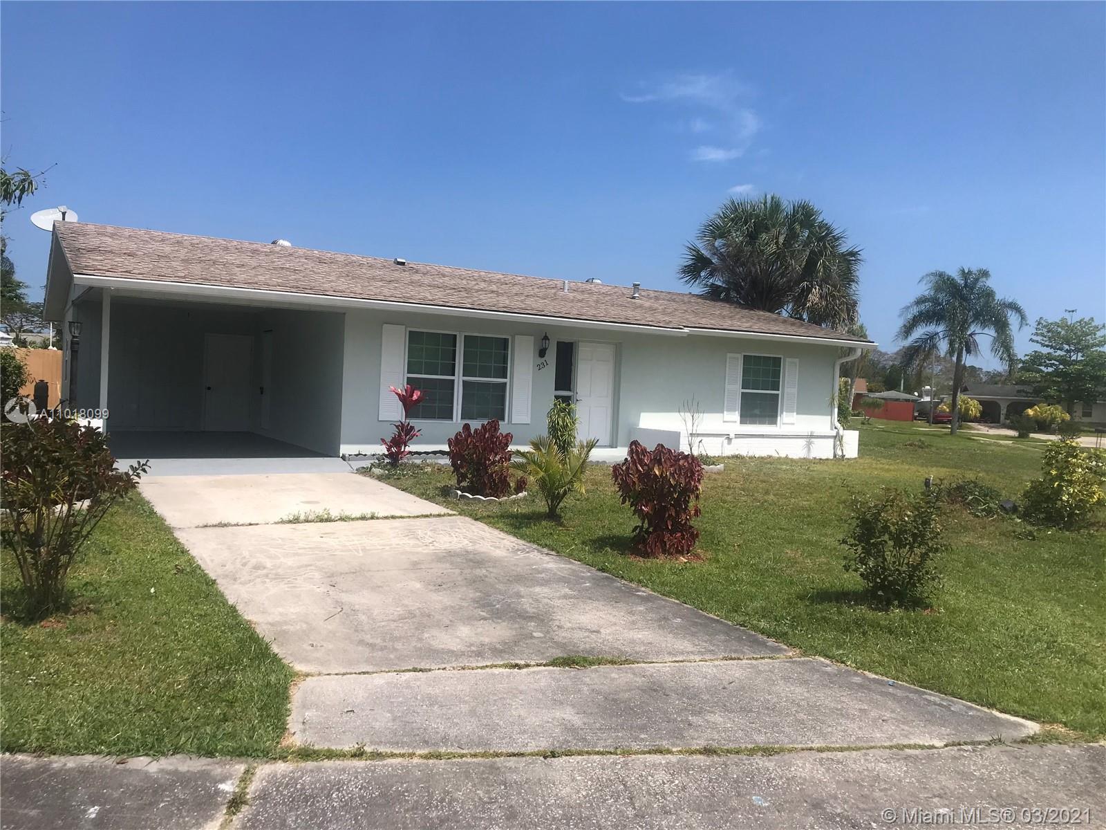 231 NE Midfield Ln, Port St. Lucie FL 34983 photo 2