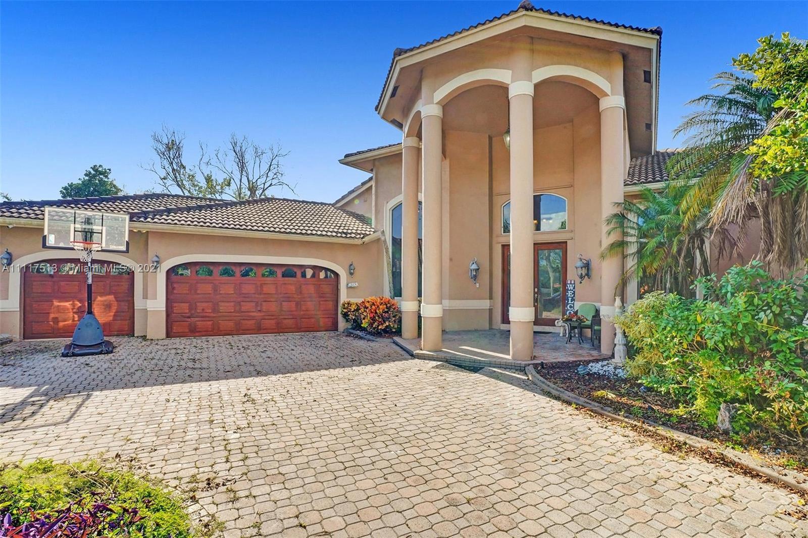7273 NW 68th Dr, Parkland FL 33067 photo 2