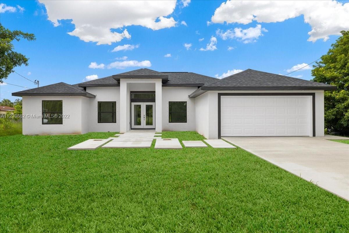 104 E Jersesy Rd, Lehigh Acres FL 33936 photo 2