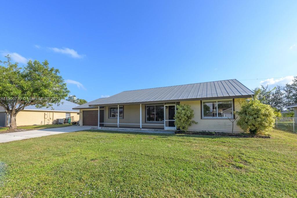 438 SW Lairo Ave, Port St. Lucie FL 34953