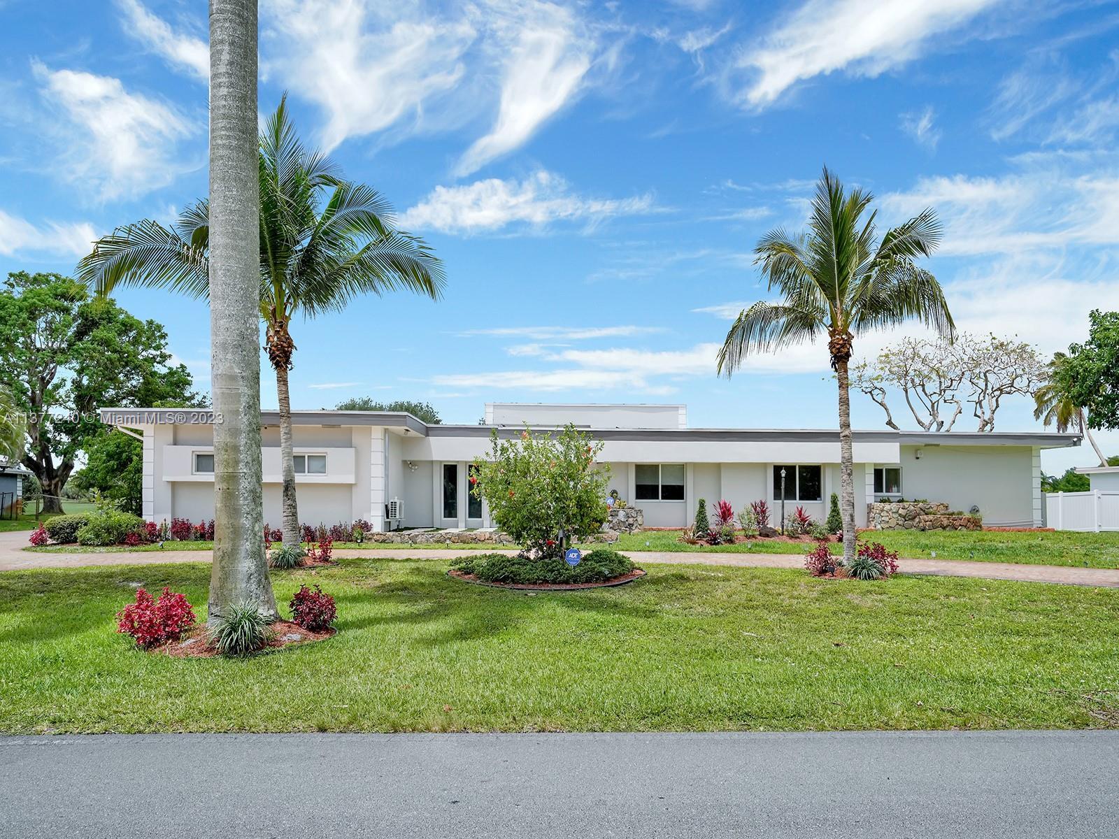 621 E Tropical WAY, Plantation FL 33317 photo 3