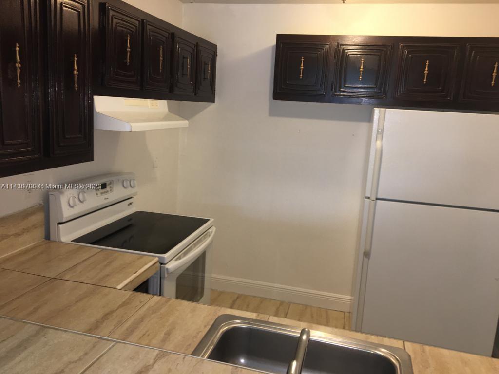 498 NW 165th St Rd # D205, Miami FL 33169 photo 2