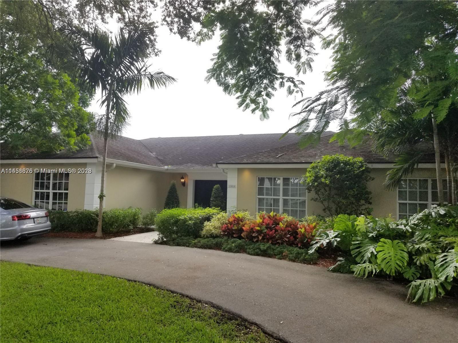 13020 N Calusa Club Dr, Miami FL 33186