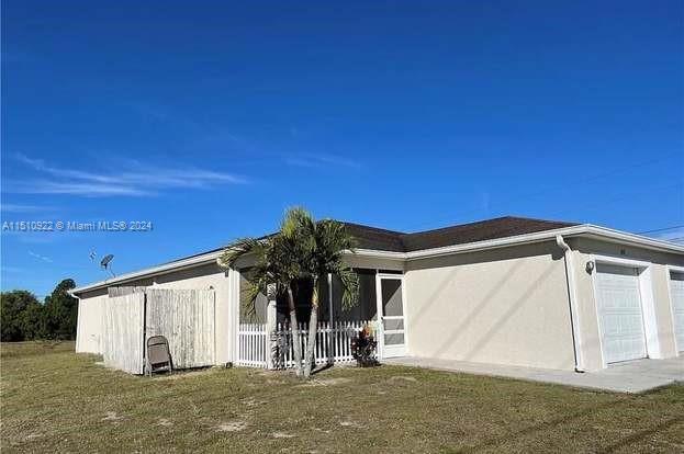 1100/1102 Gilbert Ave S, Lehigh Acres FL 33973
