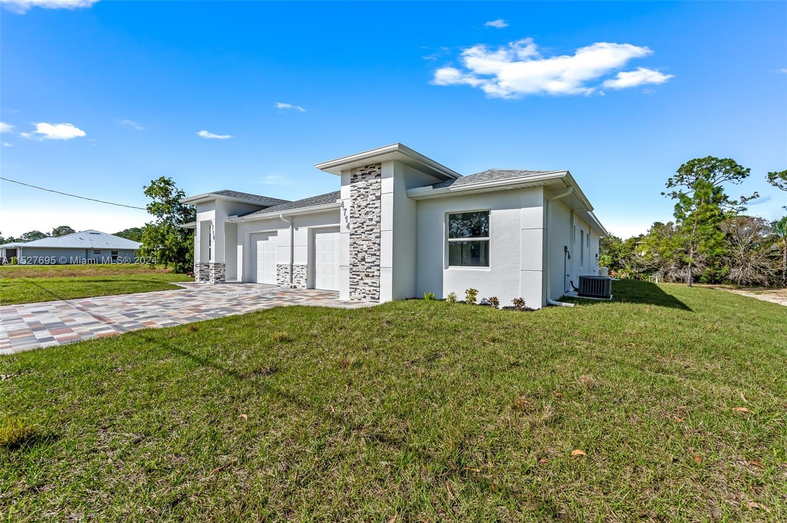 366-368 S LIMERICK AVE, Lehigh Acres FL 33974 photo 3