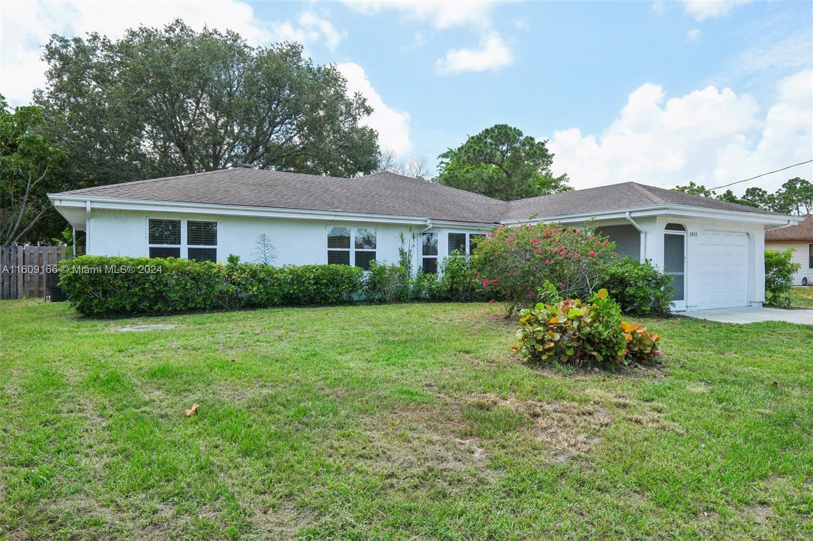 2010 SW Brisbane St, Port St. Lucie FL 34984 photo 2