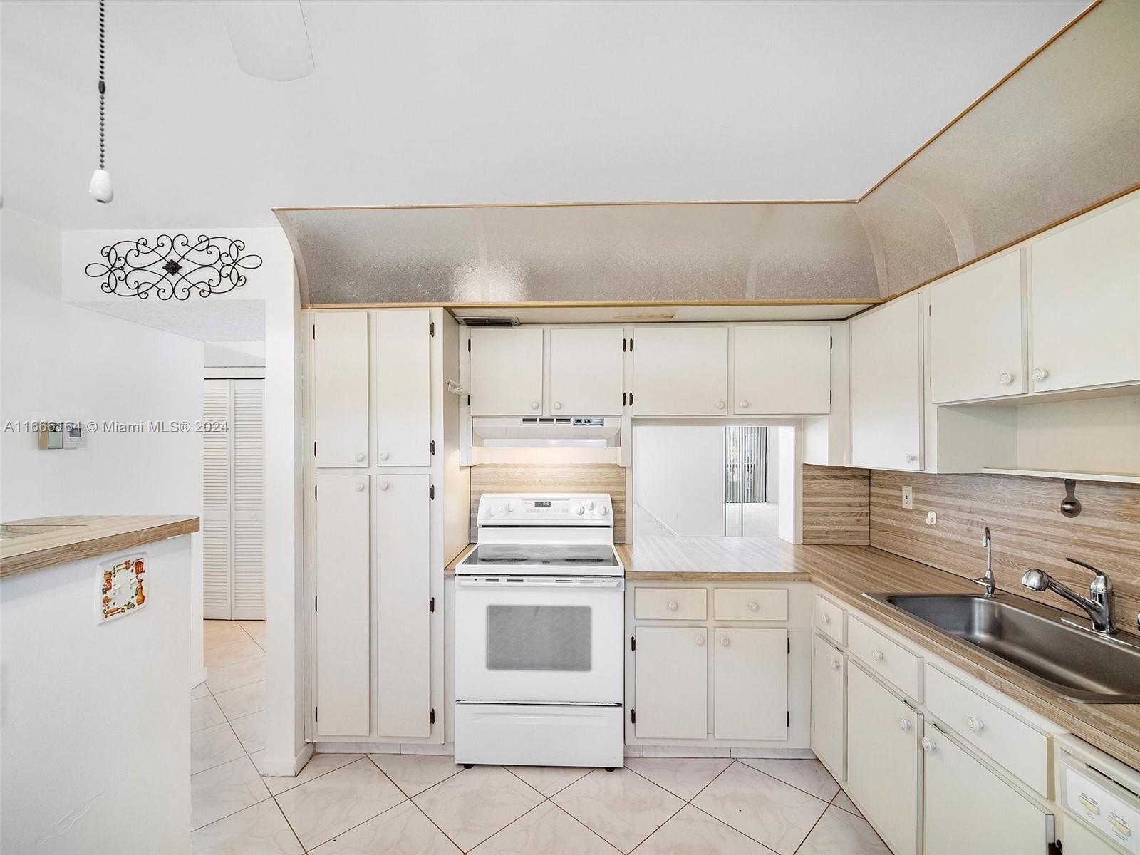 6090 N Sabal Palm Blvd # 204, Tamarac FL 33319 photo 5