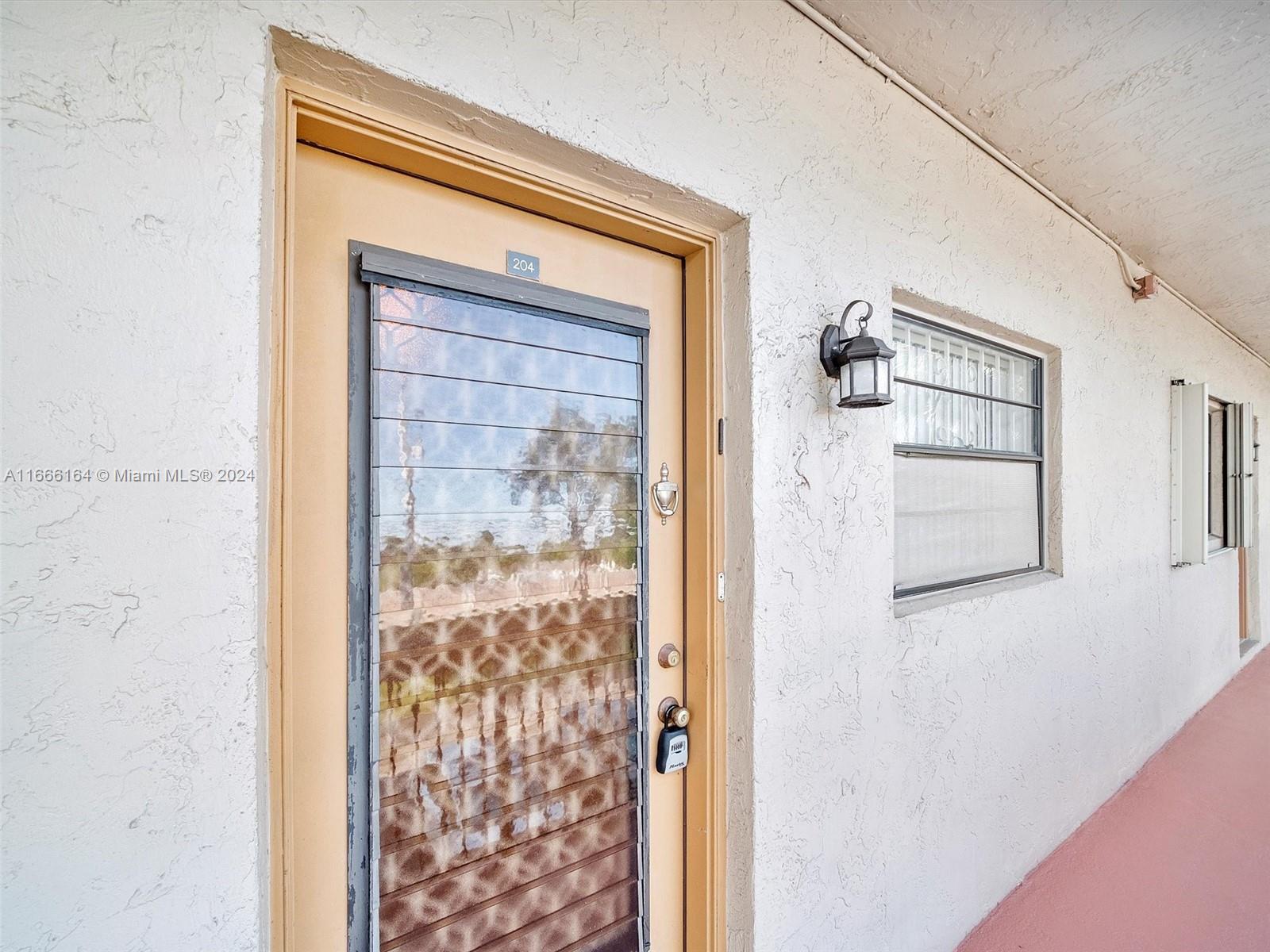 6090 N Sabal Palm Blvd # 204, Tamarac FL 33319 photo 4