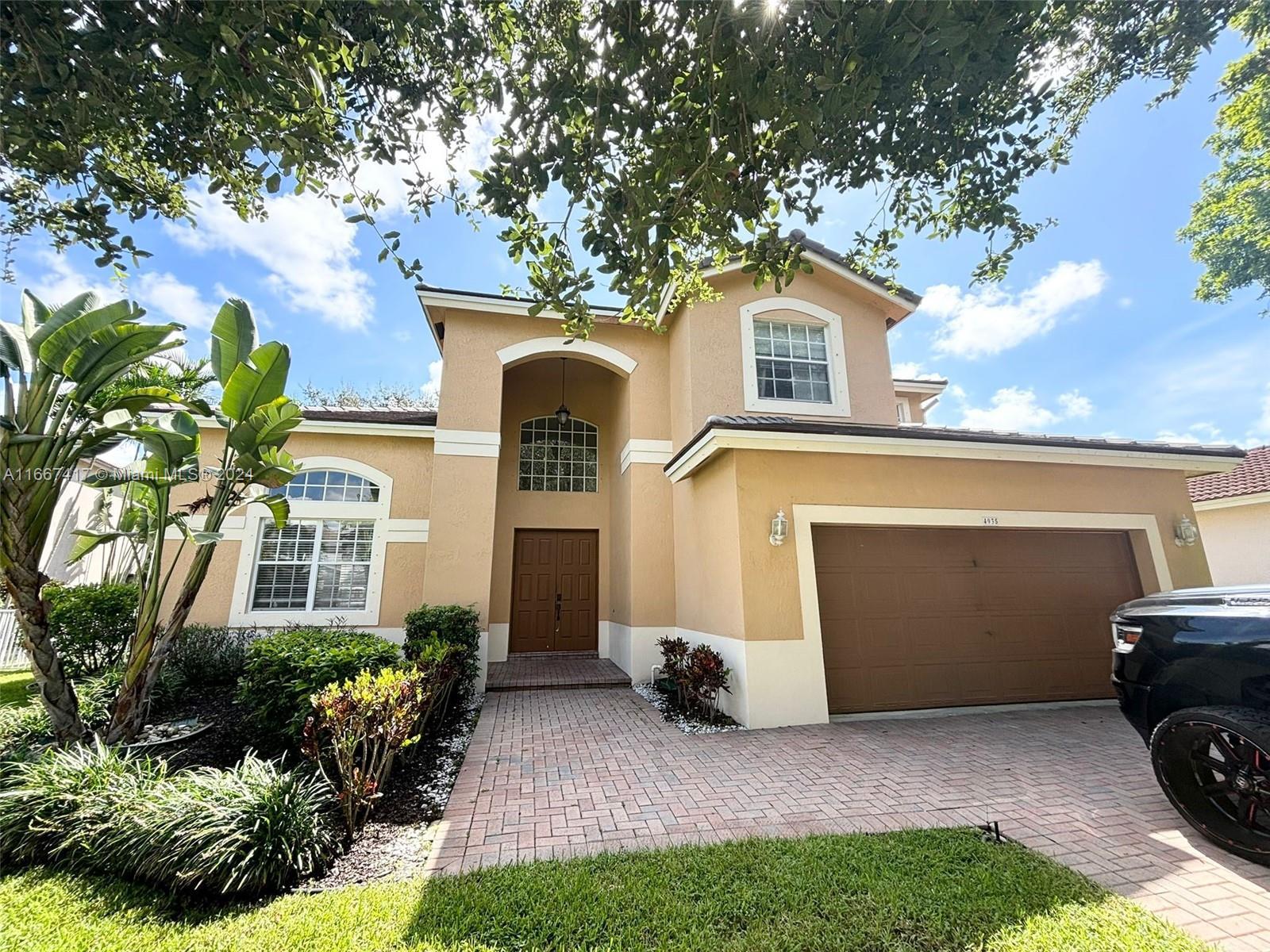 4935 NW 57th Ln, Coral Springs FL 33067