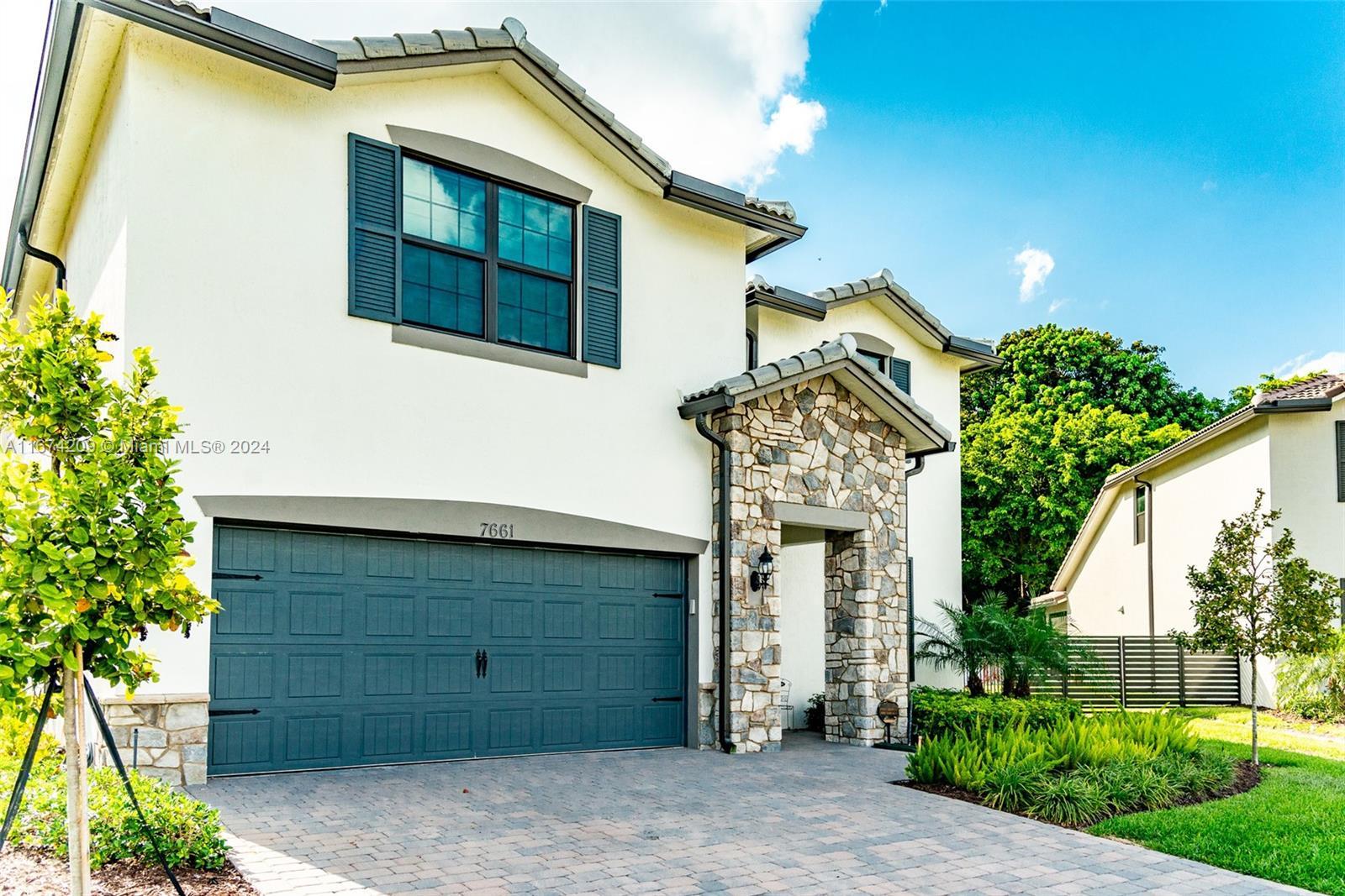 7661 NW 84th Ln, Tamarac FL 33321 photo 2