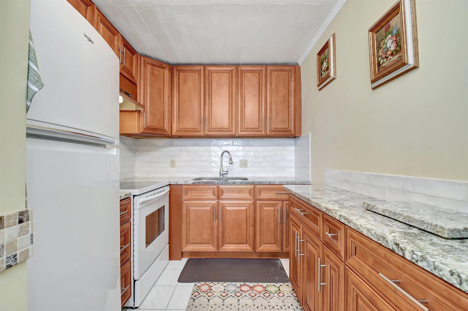 400 Village Green Circle W # 212, Palm Springs FL 33461 photo 2