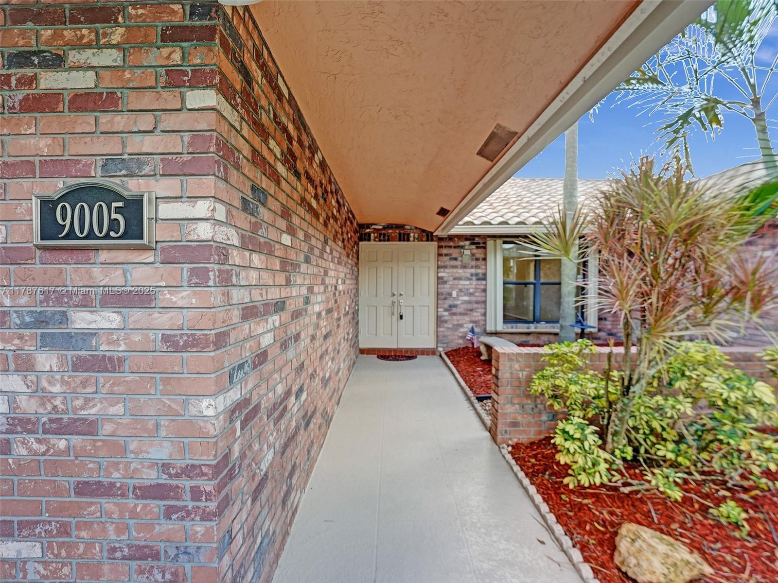 9005 NW 49th Ct, Coral Springs FL 33067 photo 2