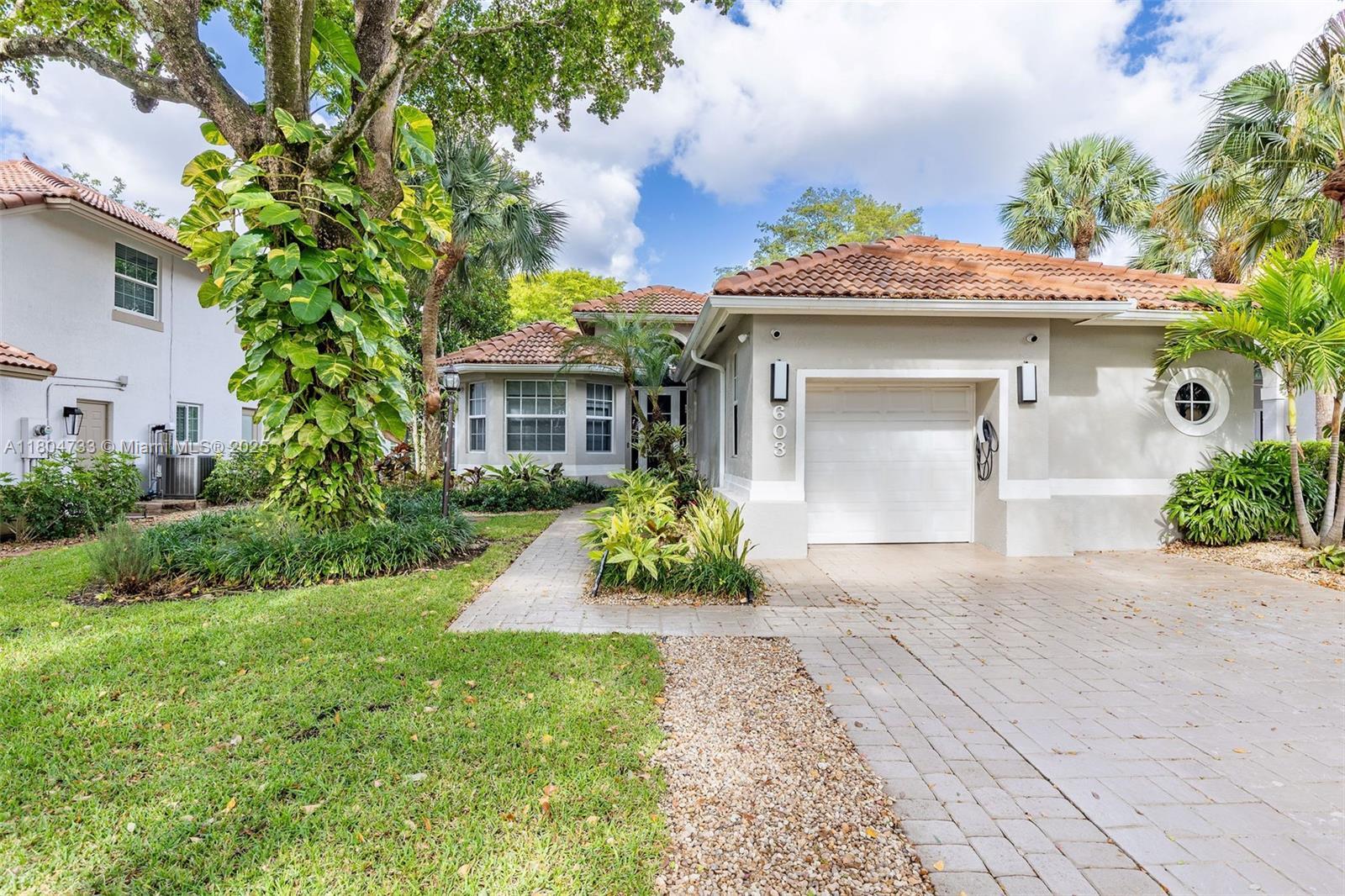 603 Misty Oaks Ln, Pompano Beach FL 33069 photo 2