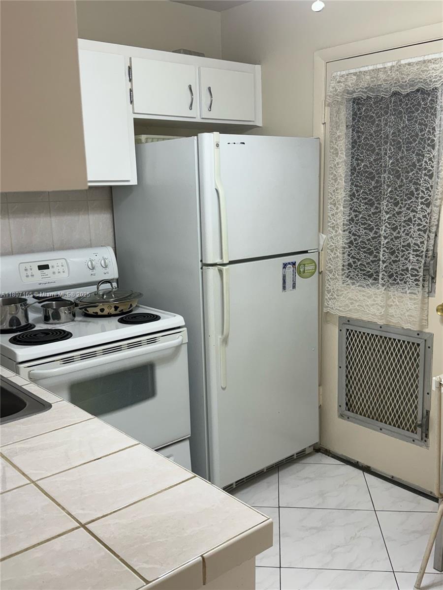 1395 NE 167th St # 203, Miami FL 33162 photo 4