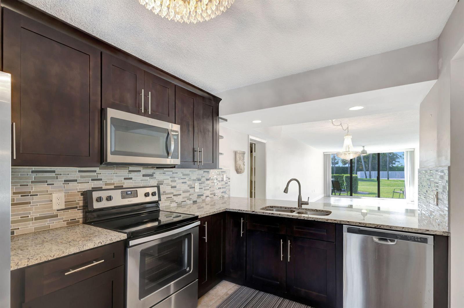 2741 Village Boulevard # 104, West Palm Beach FL 33409 photo 2