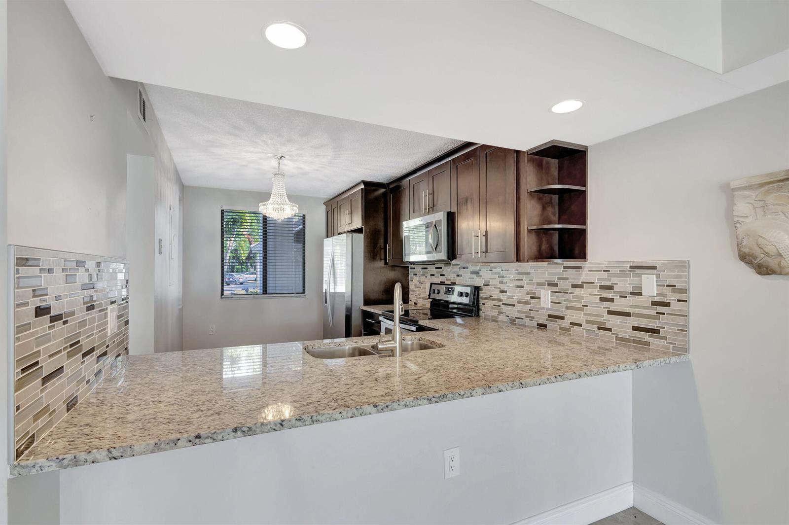 2741 Village Boulevard # 104, West Palm Beach FL 33409 photo 5
