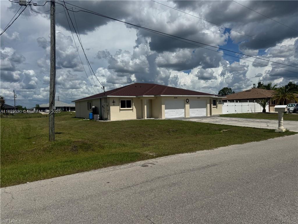 1905/1907 Gordon Ave S, Lehigh Acres FL 33973 photo 2