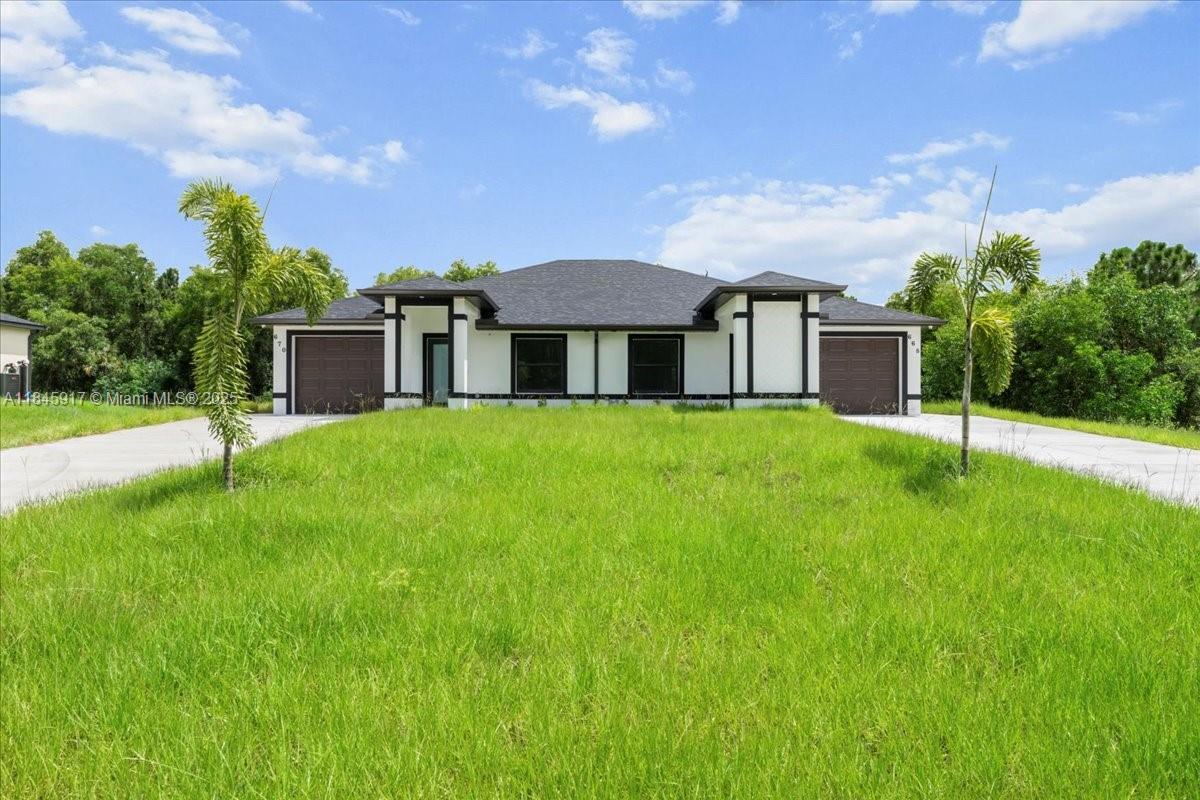 668/670 chemstrand st e, Lehigh Acres FL 33974
