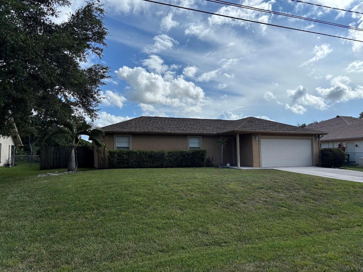 702 SW College Park Road, Port St. Lucie FL 34953