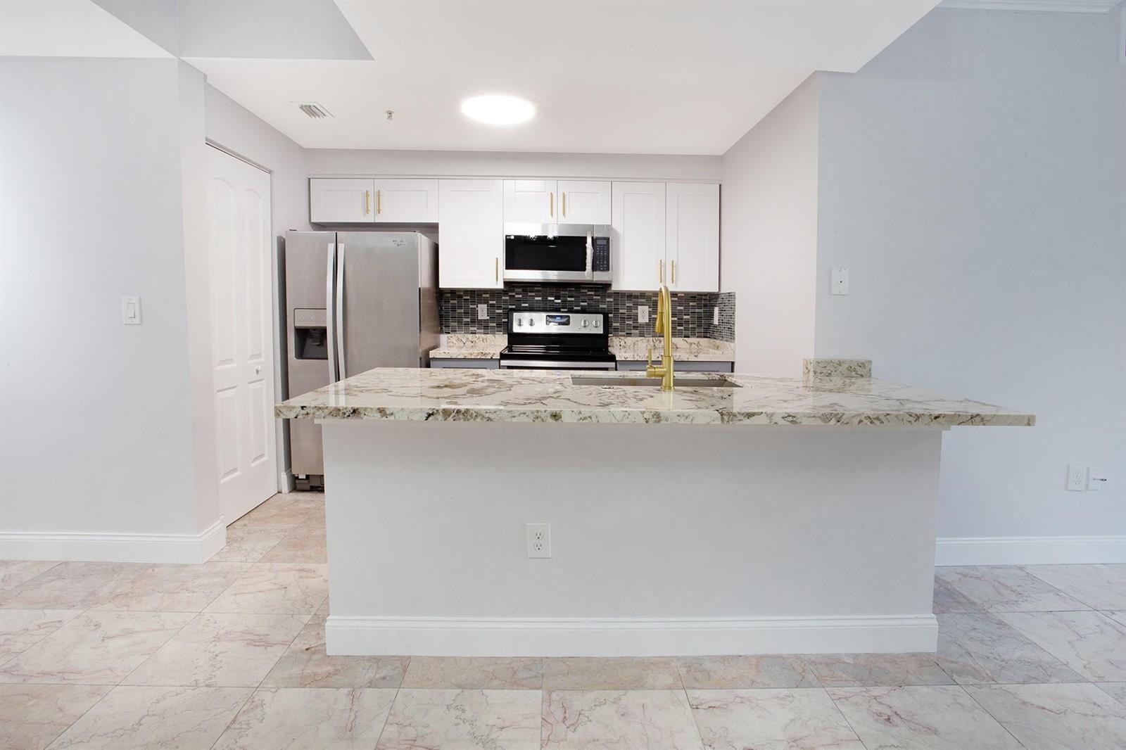 5860 W Sample Road # 204, Coral Springs FL 33067 photo 2