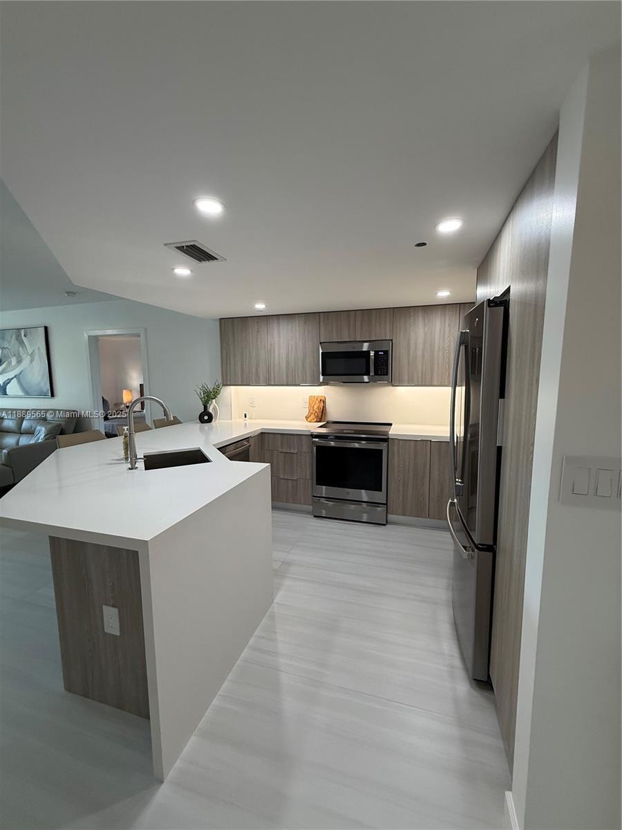 201 Golden Isles Dr # 302, Hallandale Beach FL 33009 photo 2