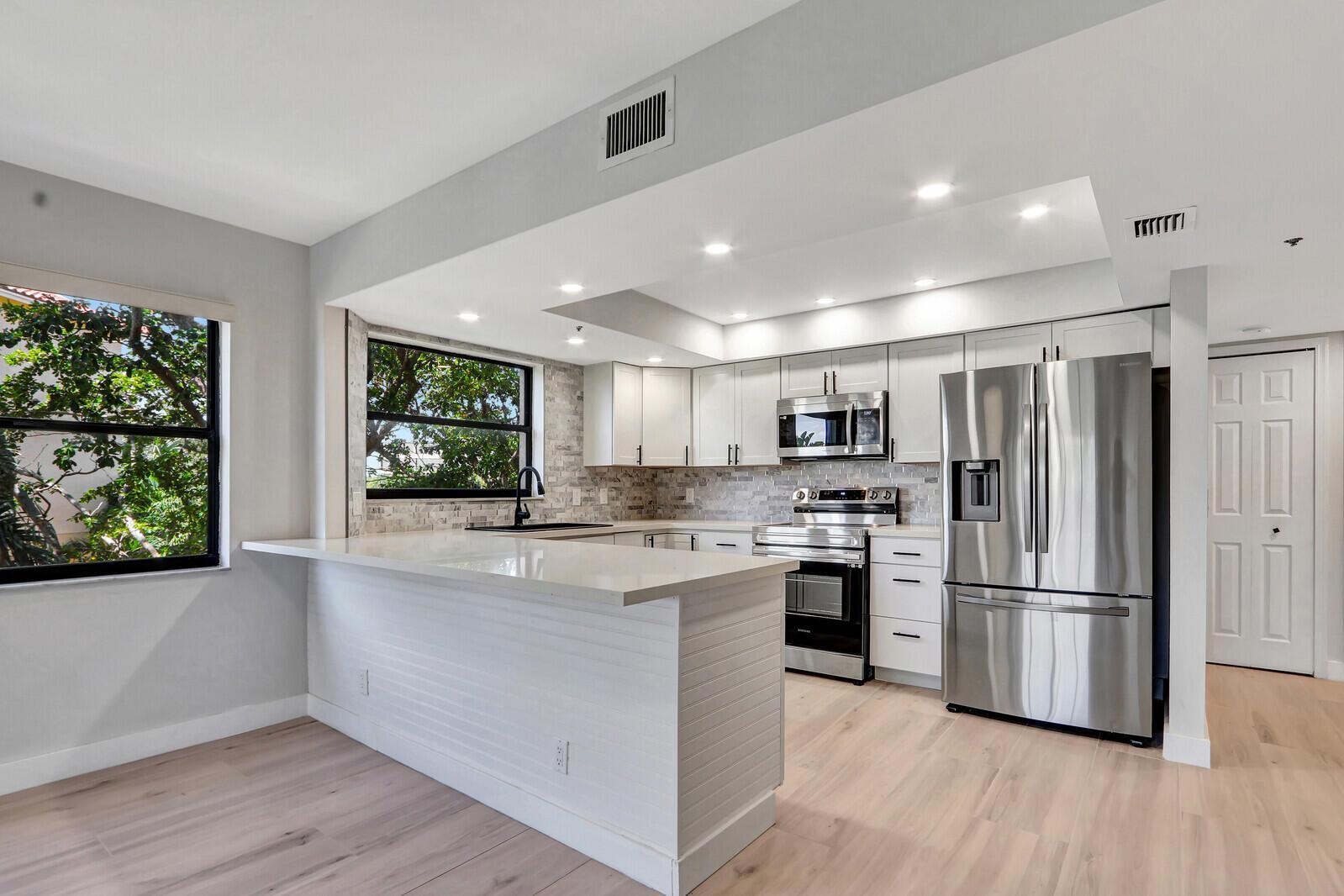 700 Uno Lago Drive # 301, Juno Beach FL 33408 photo 2