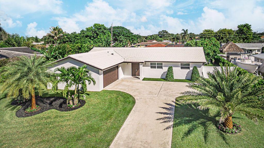 1881 Caribbean Road W, Lake Clarke Shores FL 33406