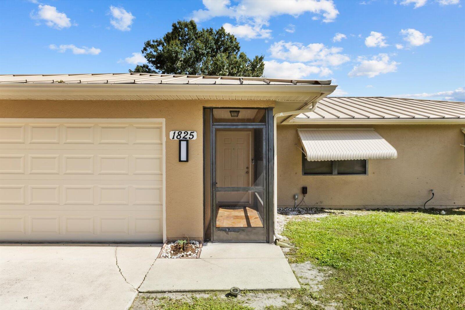 1825 SW Cameo Boulevard, Port St. Lucie FL 34953 photo 2