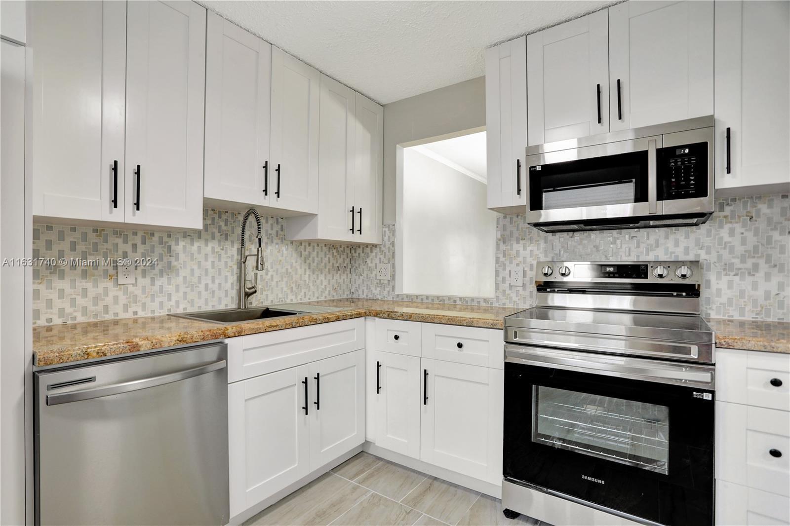 3160 Holiday Springs Boulevard # 104, Margate FL 33063 photo 3