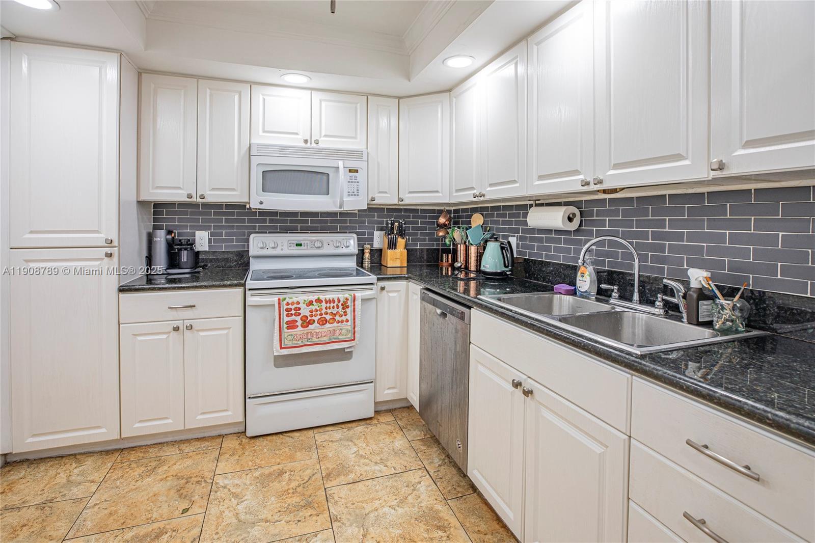 437 Golden Isles Dr # C, Hallandale Beach FL 33009 photo 3