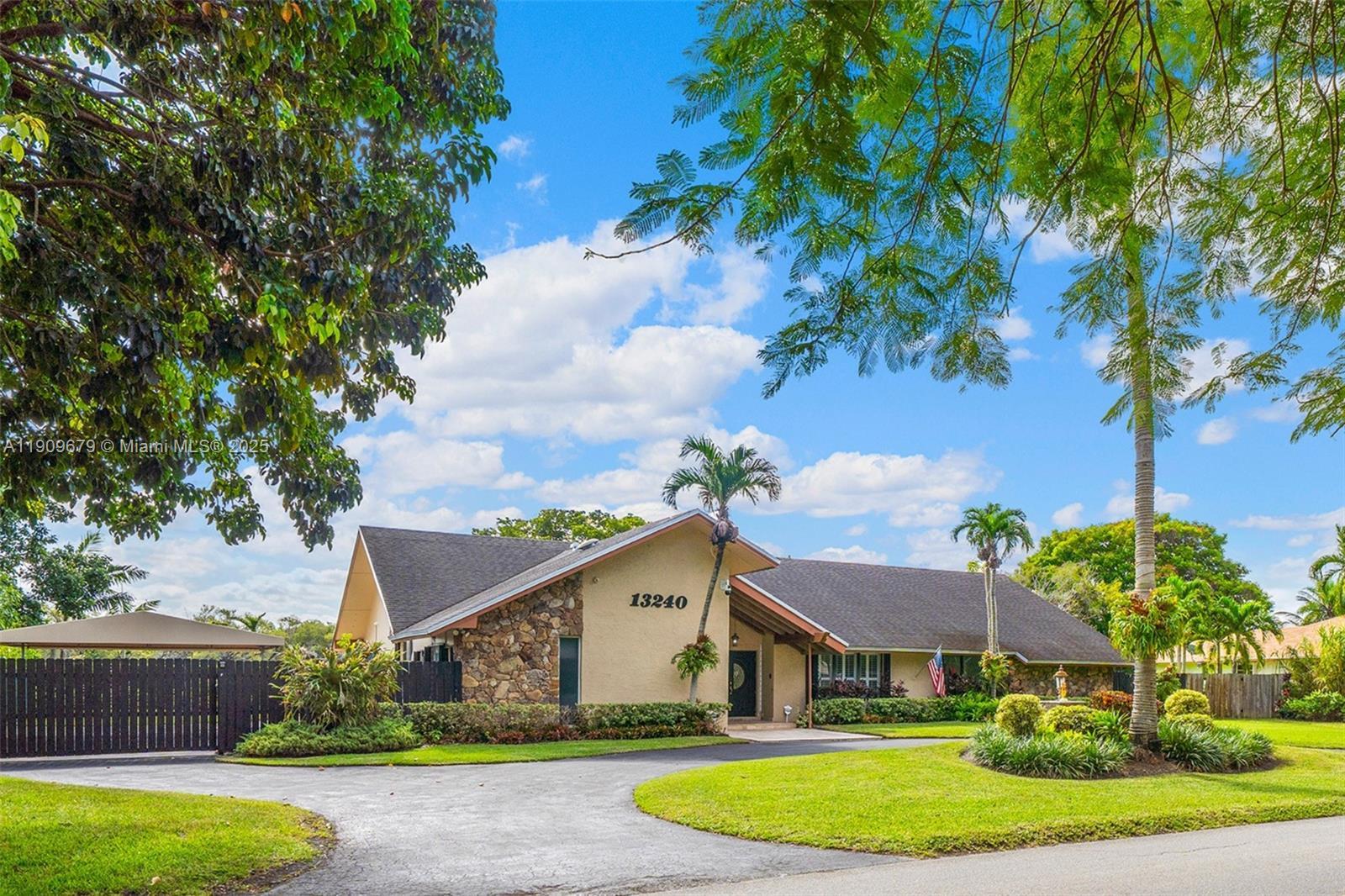13240 N Calusa Club Dr, Miami FL 33186