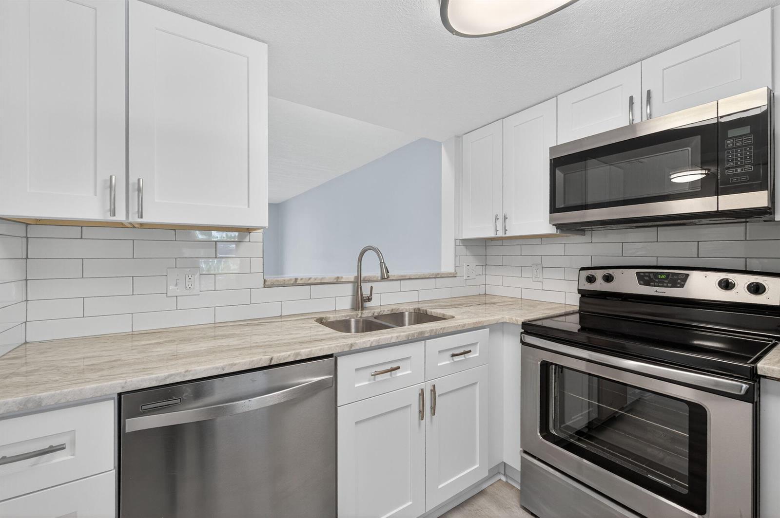 9090 Lime Bay Boulevard # 102, Tamarac FL 33321 photo 5