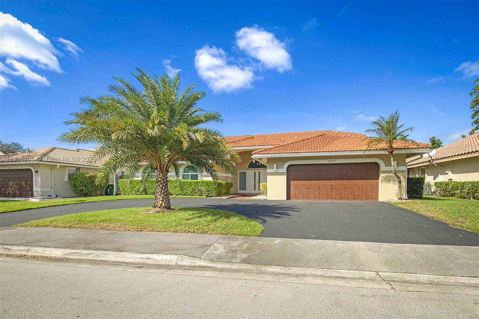 10133 NW 48th Dr, Coral Springs FL 33076 photo 2