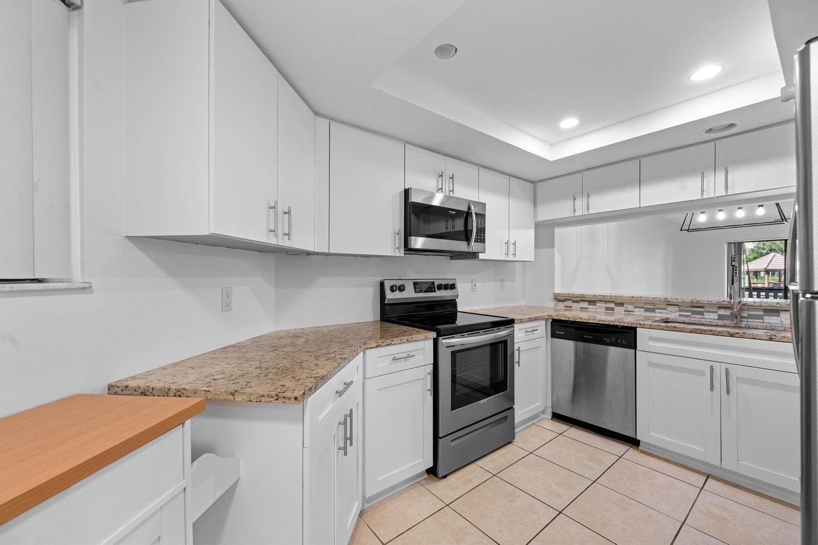 600 Uno Lago Drive # 104, Juno Beach FL 33408 photo 2