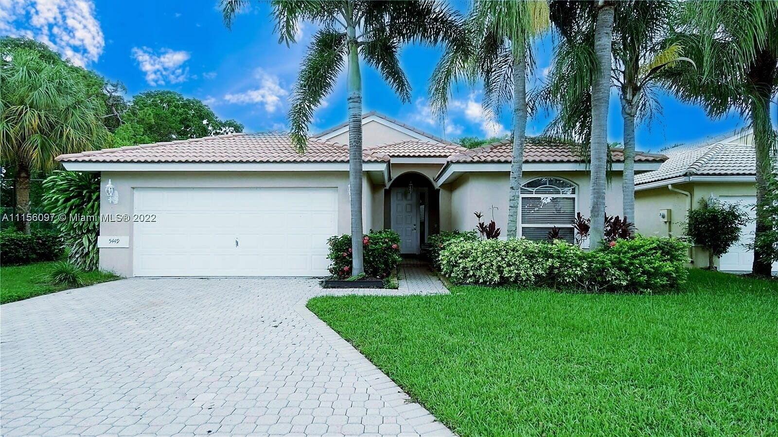 5449 Grande Palm Circle, Delray Beach FL 33484