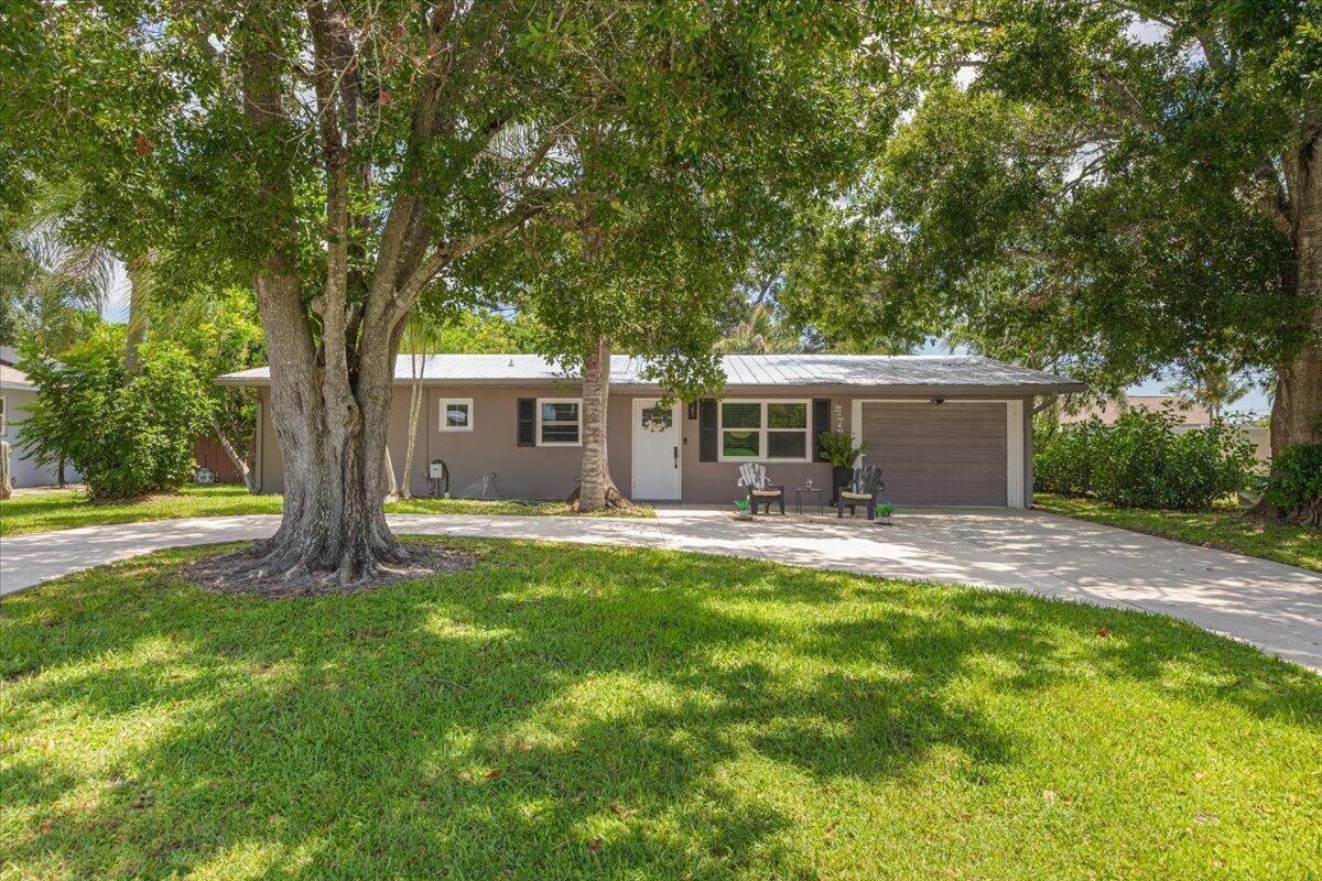 477 SE Asbury Lane, Port St. Lucie FL 34983