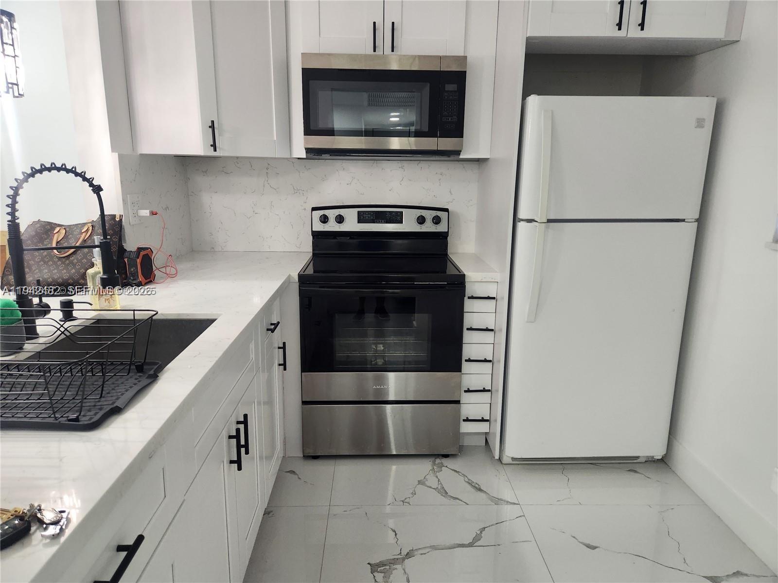 5001 NW 34th St # 305, Lauderdale Lakes FL 33319 photo 2