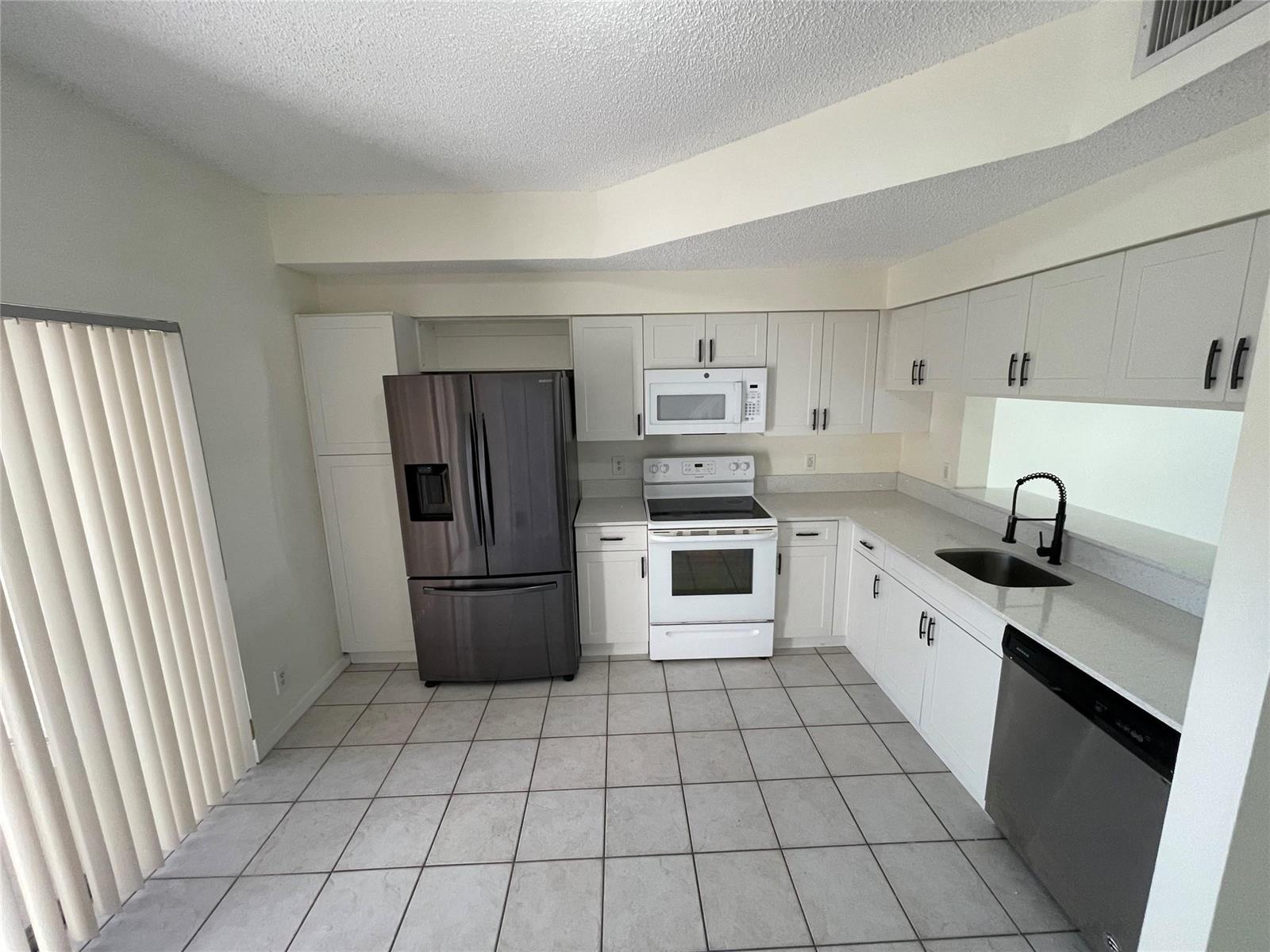 9844 NW 56th Place, Coral Springs FL 33076 photo 2