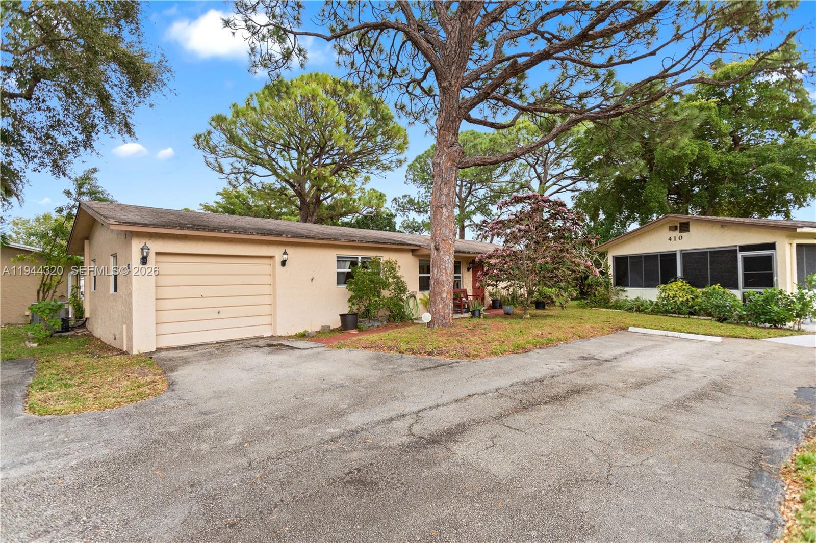 412 SW Natura Ave, Deerfield Beach FL 33441