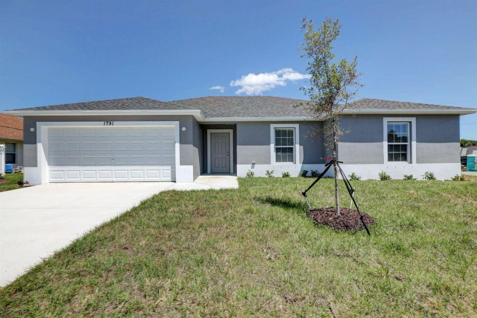 381 SW Todd Avenue, Port St. Lucie FL 34983
