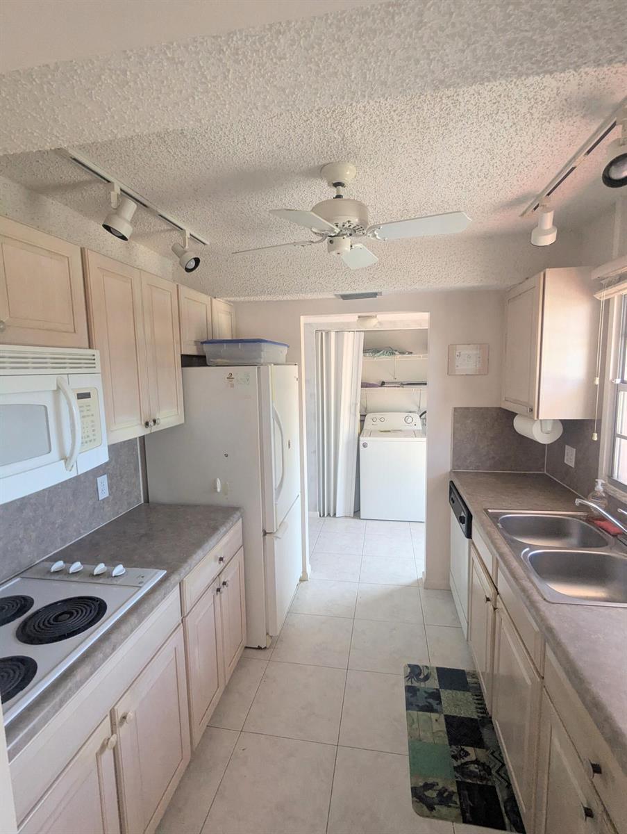 2 Golfs Edge # D, West Palm Beach FL 33417 photo 2