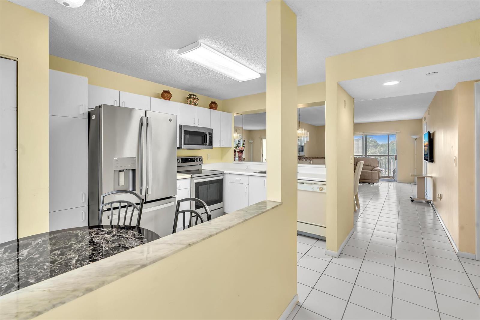 9560 Weldon Circle # J413, Tamarac FL 33321 photo 2