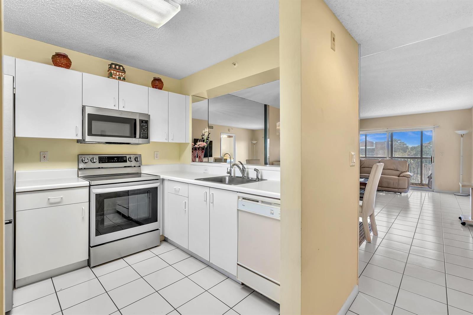 9560 Weldon Circle # J413, Tamarac FL 33321 photo 3